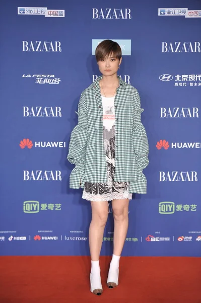 中国歌手兼女演员克里斯 李或李宇春于2018年10月12日在中国北京举行的2018年集市明星慈善晚会的红地毯上 — 图库照片