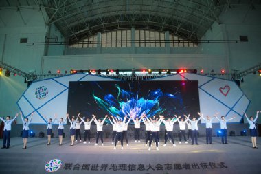 Chinese volunteers attend the launching ceremony for the upcoming United Nations World Geospatial Information Congress (UNWGIC) in Deqing county, Huzhou city, east China's Zhejiang province, 13 November 2018. *** Local Caption ***   clipart