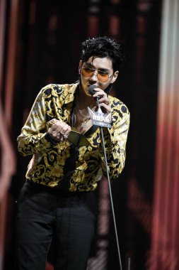 Chinese singer and actor Kris Wu or Wu Yifan performing during the 2018 Toutiao Annual Awards Ceremony in Beijing, China, 23 December 2018. clipart