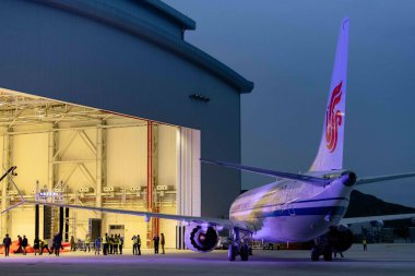 The first airplane of the Boeing 737 MAX 8 to be delivered to Air China is pictured at the Boeing Zhoushan 737 Completion and Delivery Center in Zhoushan city, east China's Zhejiang province, 15 December 2018 clipart