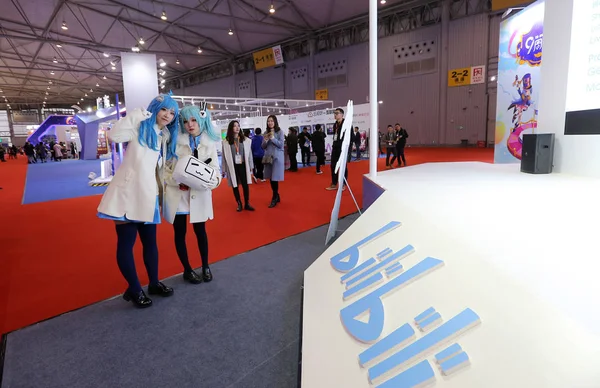 --FILE--People visit the stand of Bilibili, a leading Chinese video-sharing streaming website themed around anime, comic and game fandom, during an exhibition in Chengdu city, southwest China\'s Sichuan province, 29 November 2018.