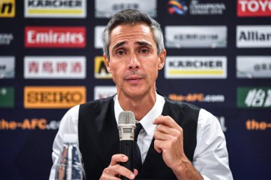 Head coach Paulo Sousa of China's Tianjin Quanjian attends a press conference after the quarterfinal 2nd leg match against Japan's Kashima Antlers during the 2018 AFC Champions League in Macau, China, 18 September 2018 clipart