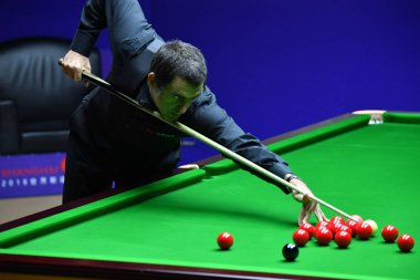 Ronnie O'Sullivan of England plays a shot to Stuart Bingham of England in their quarterfinal match during the 2018 Shanghai Masters snooker tournament in Shanghai, China, 13 September 2018. clipart