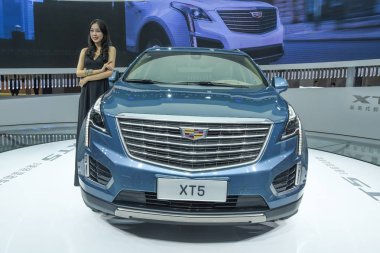 A Cadillac XT5 of General Motors (GM) is on display during an exhibition in Chengdu city, southwest China's Sichuan province, 25 August 2017 clipart