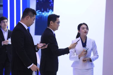 Pony Ma Huateng, Chairman and CEO of Tencent Holdings Ltd., is pictured at the stand of Tencent during the 