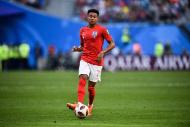 Jesse Lingard of England dribbles against Belgium in their third place match during the 2018 FIFA World Cup in Saint Petersburg, Russia, 14 July 2018. clipart