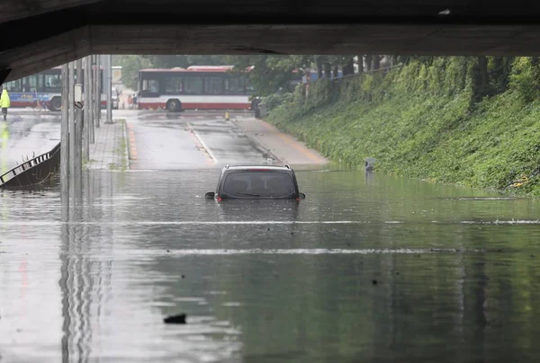 Car Half Submerged Floodwater Caused Torrential Rains Underpass Bridge Beijing — Stock Photo, Image