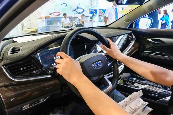 Visitor Tries Out Electric Vehicle Geely Automobile Exhibition Shanghai China — Stok fotoğraf