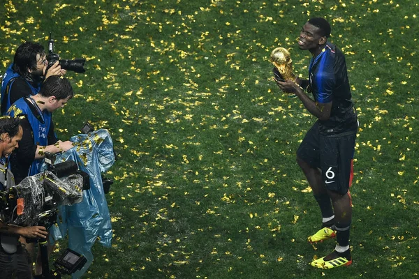 stock image Paul Pogba of France poses with the World Cup trophy after France defeated Croatia in their final match during the 2018 FIFA World Cup in Moscow, Russia, 15 July 2018.