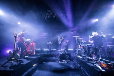 Singer Mike Shinoda of American rock band Linkin Park performs during a tour concert in Chengdu city, southwest China's Sichuan province, 16 August 2018.