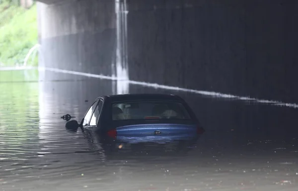 Car Half Submerged Floodwater Caused Torrential Rains Underpass Bridge Beijing — Stock Photo, Image