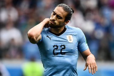 Martin Caceres of Uruguay reacts as he competes against France in their quarterfinal match during the 2018 FIFA World Cup in Nizhny Novgorod, Russia, 6 July 2018