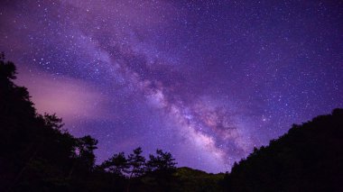 Landscape of the starry sky above Longquan Mountain in Lishui city, east China's Zhejiang province, 10 July 2018. clipart
