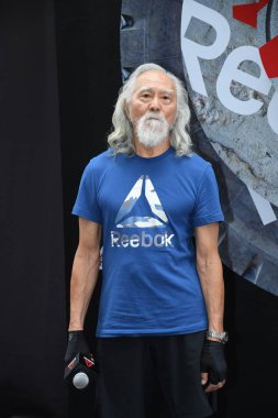82-year-old Chinese model Wang Deshun attends a promotional event for 