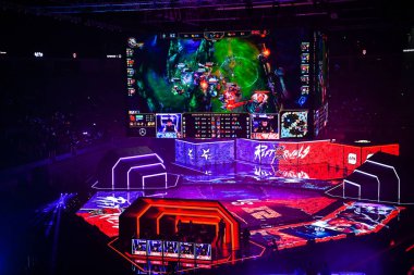 s-Players of China's Royal Never Give Up (RNG) and South Korea's KING-ZONE DragonX (KZ) compete in the League of Legends (LOL) Rift Rivals 2018 in Dalian city, northeast China's Liaoning province, 6 July 2018