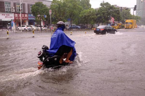 Cyclist Rides Flooded Road Strong Wind Heavy Rain Caused Fourth — Stock Photo, Image