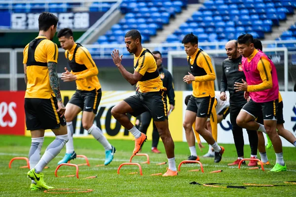 stock image Players of China's Guangzhou Evergrande Taobao take part in a training session before the first Round of 16 match against China's Tianjin Quanjian during the 2018 AFC Champions League in Tianjin, China, 7 May 2018.