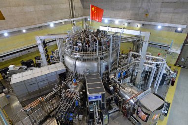 Scientists have an experiment on the Experimental Advanced Superconducting Tokamak (EAST) magnetic fusion device for the International Thermonuclear Experimental Reactor (ITER), the world's largest nuclear fusion project clipart