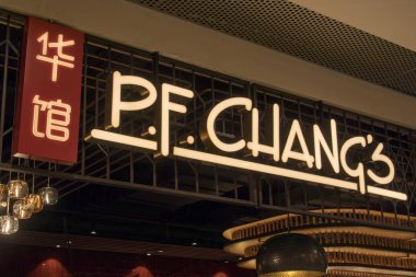 View of an outlet of PF Chang's, an American Chinese restaurant chain that is featured in the hit comedy sitcom The Big Bang Theory, at a shopping mall on East Nanjing Road in Shanghai, China, 24 May 2018 clipart