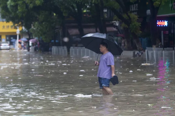 Local Resident Shields Himself Umbrella Walks Flooded Road Heavy Rainstorm — Stock Photo, Image