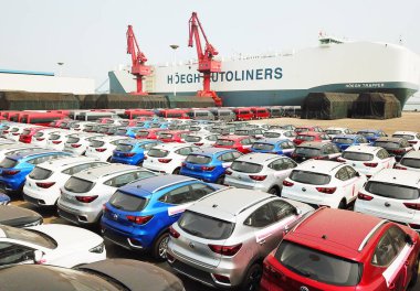 Aerial view of 619 MG cars produced by SAIC Motor Corp (Shanghai Automotive Industry Corporation) waiting to be exported to England at a port in Lianyungang city, east China's Jiangsu province, 8 June 2018 clipart