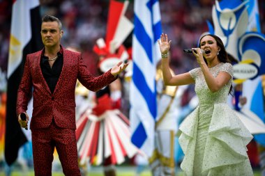 English singer Robbie Williams, left, and Russian soprano Aida Garifullina perform during the opening ceremony of the FIFA World Cup 2018 Russia in Moscow, Russia, 14 June 2018.
