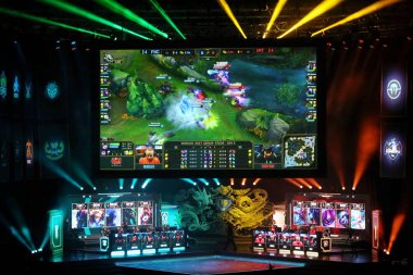 Players of European team Fnatic and American team Immortals compete in the online game, League of Legends (LOL) during the 2017 League of Legends World Championship in Wuhan city, central China's Hubei province, 14 October 2017