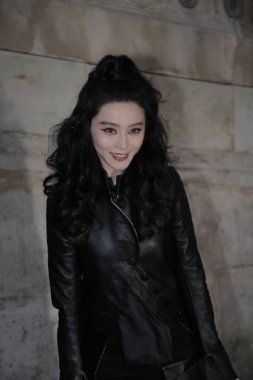 Chinese actress Fan Bingbing poses as she arrives at the Louis Vuitton show during the Paris Fashion Week Fall/Winter 2018 in Paris, France, 6 March 2018. clipart