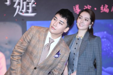 South Korean singer and actor Lee Seung-hyun, better known by his stage name Seungri, left, of boy group BigBang (Big Bang), and Taiwanese actress Bea Hayden or Guo Bi-ting attend a press conference for new movie 