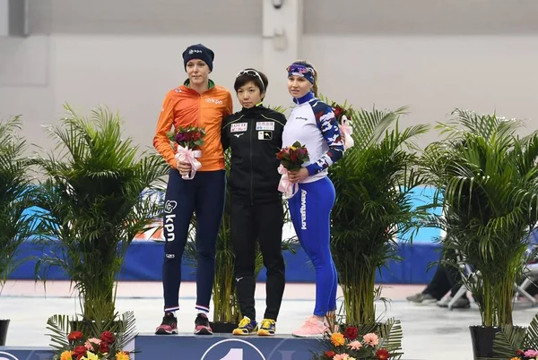 stock image (From left) Second runner-up Jorien ter Mors of the Netherlands, winner Nao Kodaira of Japan and first runner-up Angelina Golikova of Russia pose on the podium after the women's 500m final match during the 2018 ISU World Sprint Speed Skating Champion