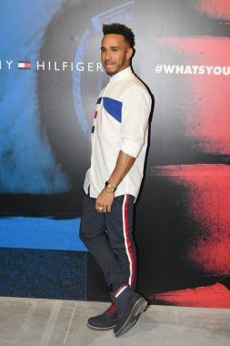 Mercedes' British F1 driver Lewis Hamilton attends a promotional event by fashion brand Tommy Hilfiger in Shanghai, China, 11 April 2018.