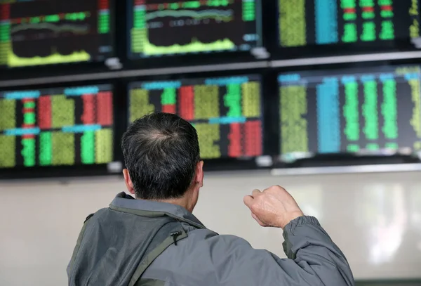 Chinese Investor Looks Stock Indices Prices Shares Red Price Rising — Stock Photo, Image