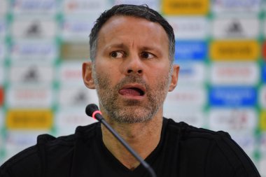 Head coach Ryan Giggs of Wales national football team attends a press conference before the semi-final match against China during the 2018 Gree China Cup International Football Championship in Nanning city, south China's Guangxi Zhuang Autonomous Reg clipart
