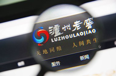 A Chinese netizen browses the website of Chinese fiery liquor Luzhou Laojiao in Ji'nan city, east China's Shandong province, 15 August 2017 clipart