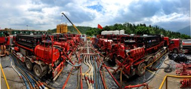 Hydraulic fracturing devices are pictured at a shale gas well of the Sinopec Fuling Shale Gas Project in Chongqing, China, 19 July 2014 clipart