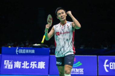 Kento Momota of Japan reacts after defeating Chen Long of China in their men's singles final match during the 2018 Badminton Asia Championships in Wuhan city, central China's Hubei province, 29 April 2018 clipart