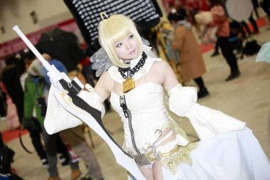 Chinese coser dressed in cosplay costume poses during the 25th I Do ACG Expo in Beijing, China, 31 December 2017 clipart