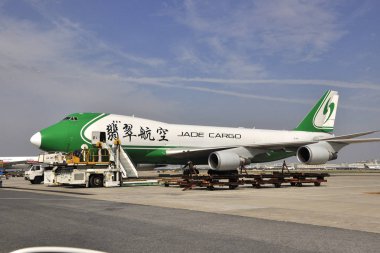 A Boeing 747 freight plane of Jade Cargo International is pictured at the Shanghai Pudong International Airport in Shanghai, China, 21 October 2010 clipart