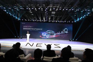 Jiang Dalong, chairman of National Electric Vehicle Sweden (NEVS), delivers a speech during the off-line ceremony for its first NEVS 9-3 series EV at Tianjin Binhai Hi-tech Industrial Development Area (THT) in Tianjin, China, 5 December 2017 clipart