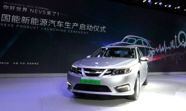 The first NEVS 9-3 series EV of National Electric Vehicle Sweden is unveiled during the off-line ceremony at Tianjin Binhai Hi-tech Industrial Development Area (THT) in Tianjin, China, 5 December 2017 clipart