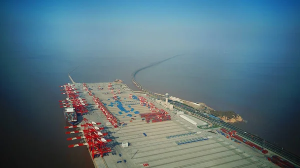 Aerial view of containers at the fourth phase of the Yangshan Deep-Water Port, the world's largest automated cargo wharf to start trial operation, in Shanghai, China, 6 December 2017 — Stock Image Aerial View Containers Fourth Phase Yangshan Deep Water Port World Royalty Free Stock Photos