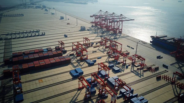 Aerial view of containers at the fourth phase of the Yangshan Deep-Water Port, the world's largest automated cargo wharf to start trial operation, in Shanghai, China, 6 December 2017 — Stock Image Aerial View Containers Fourth Phase Yangshan Deep Water Port World Stock Photo