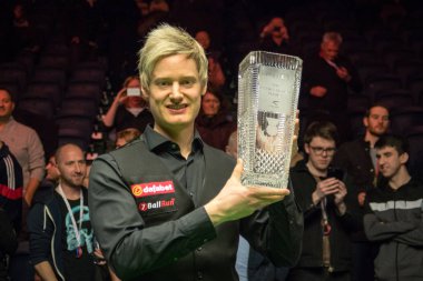 Neil Robertson of Australia poses with his trophy after defeating Cao Yupeng of China in their final match during the 2017 Dafabet Scottish Open snooker tournament in Glasgow, UK, 17 December 2017 clipart