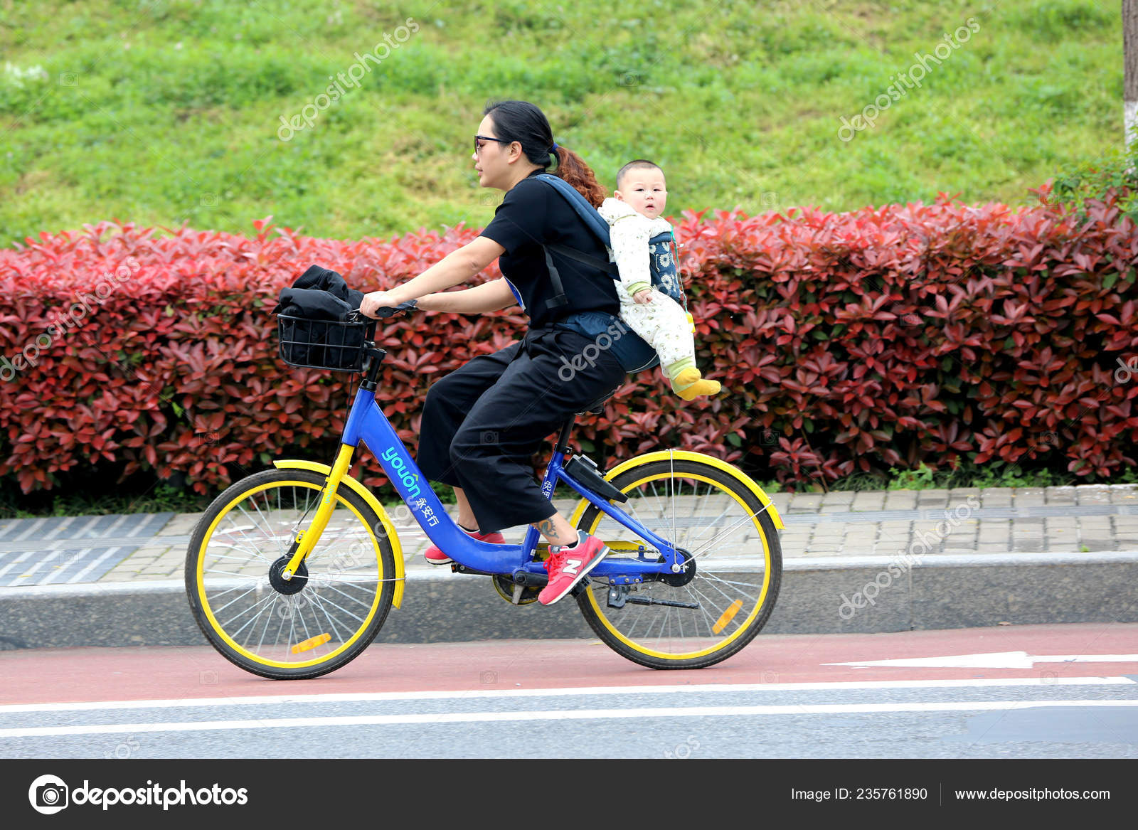 baby riding bicycle