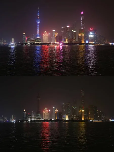 この合成写真は 陸家嘴の建物や高層ビルを持つ金融街の前 中国上海でのアースアワーキャンペーン中に 3月25日2017を示しています — ストック写真