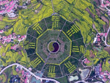 A scenic spot featuring the shape of a giant Bagua is seen in Pipa county, Huairen city, southwest China's Guizhou province, 29 March 2017 clipart