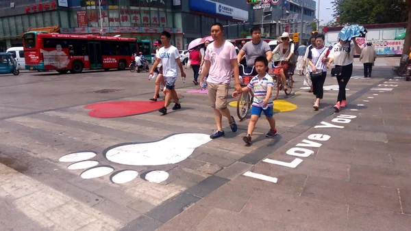 Local Residents Walk Pedestrian Crossing Featuring Hearts Footprints Words Love — Stock Photo, Image