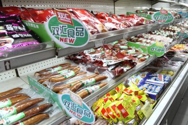 Sausages of Shineway or Shuanghui Group, now called WH Group, are for sale at a supermarket in Luohe city, central China's Henan province, 21 April 2016 clipart