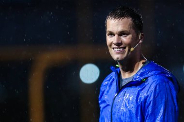 American football player Tom Brady for the New England Patriots of the National Football League (NFL) takes part in a football training camp in Shanghai, China, 20 June 2017. clipart