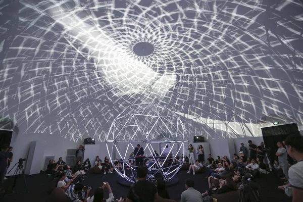 Visitors Lie Enjoy Electronic Music Performance Illuminated Tracks Projected Sphere — Stock Photo, Image